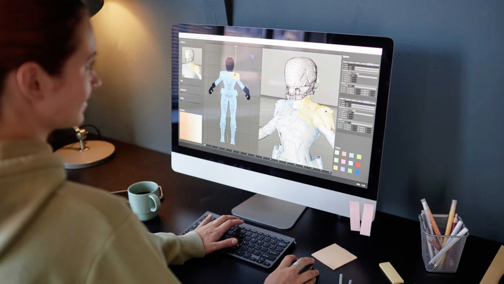 3D artist creating detailed character models using professional software for gaming and animation projects